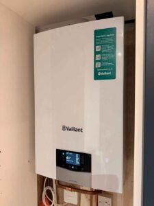 Vaillant ecoTEC Plus boiler installed in airing cupboard, London