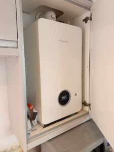 Worcester combi boiler installed in kitchen cabinet, London